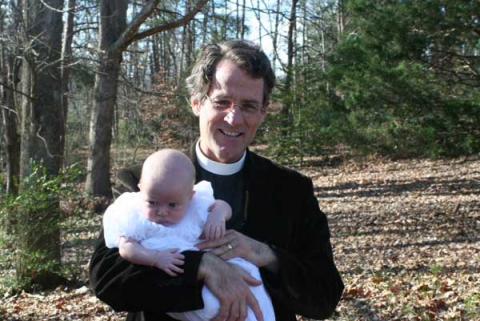 Rev. Gerald McDermott at the christening of his fifth grandchild. RNS photo courtesy Gerald McDermott RNS photo courtesy Gerald McDermott
