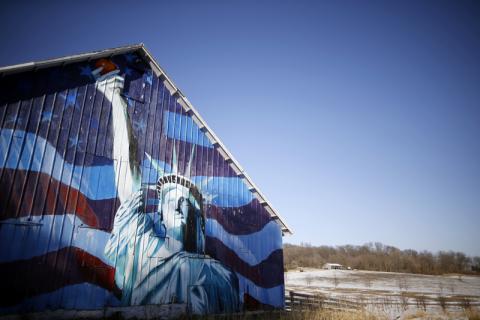 A barn painted with an image of the Statue of Liberty and a U.S. flag in Mount Vernon, Iowa. Photo via REUTERS / Jim Young / RNS Photo via REUTERS / Jim Young / RNS