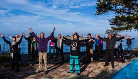 Caught in the rapture - Tai Chi on the pool deck with Al Huang at Esalen Institute. RNS photo by Chris Franek RNS photo by Chris Franek
