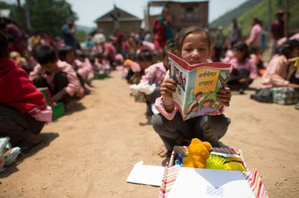 A child receives a gift from Operation Christmas Child. Photo: RNS courtesy Samaritan’s Purse.