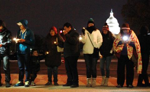 Immigration reform supporters pray and sing in English and Spanish outside the U.S. Capitol. Photo via Katherine Burgess / RNS Photo via Katherine Burgess / RNS