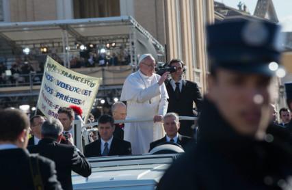 Pope Francis waves from the pope-mobile during his inauguration Mass on Tuesday. RNS photo by Andrea Sabbadini RNS photo by Andrea Sabbadini