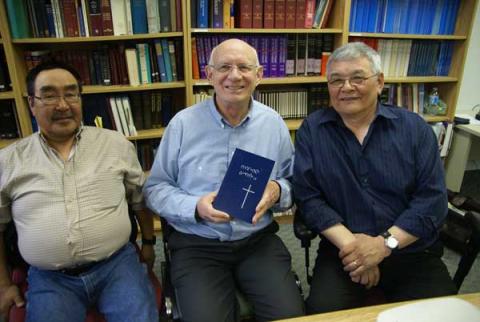 Inuktitut Bible translators flank director of scripture translation for the Canadian Bible Society. RNS photo by Ron Csillag RNS photo by Ron Csillag