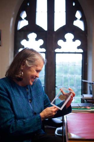 Karen King, an historian of early Christianity at Harvard Divinity School, holds the papyrus that may suggest Jesus married.