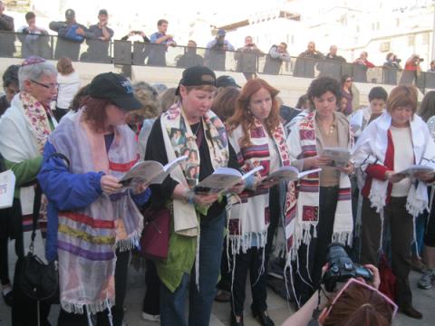 Many members and supporters of Women of the Wall pray with prayer shawls. RNS file photo by Michele Chabin