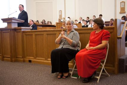 Karen Birdsall (L) and Kammi Bean sign at The Church of Jesus Christ of Latter-day Saints – Lenexa Ward. RNS photo: Sally Morrow