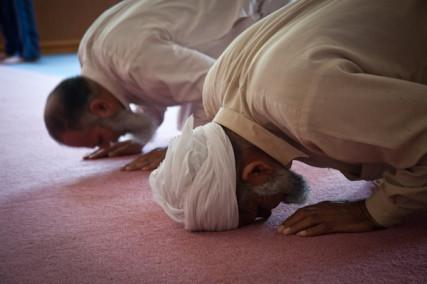 Muhhamad Shafiq and Hazem Hassan pray at the Islamic Society of Greater Kansas City. RNS photo by Sally Morrow RNS photo by Sally Morrow