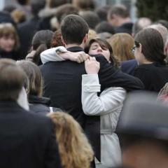 Some of the grieving are left wondering why God let this happen. RNS Photo RNS Photo
