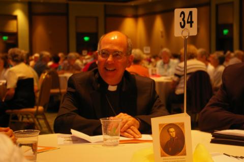 Seattle Archbishop J. Peter Sartain, LCWR’s apostolic delegate, is seen at the group’s annual assembly Aug. 13. Photo via RNS. Seattle Archbishop J. Peter Sartain, LCWR’s apostolic delegate, is seen at the g