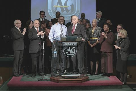 Pentecostal leaders Thomas Barclay and George O. Wood, center, stand together. Photo courtesy of Jorge Tobar/RNS