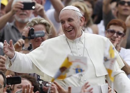 Pope Francis greets the crowd in St. Peter’s Square. Photo by Paul Haring/Catholic News Service Photo by Paul Haring/Catholic News Service