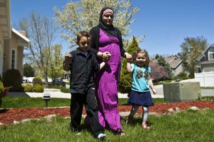 Sharifa Al-Qaaydeh and her kids walk around their home Wednesday May 4, 2011. Photo by Chris Detrick | The Salt Lake Tribune Photo by Chris Detrick | The Salt Lake Tribune