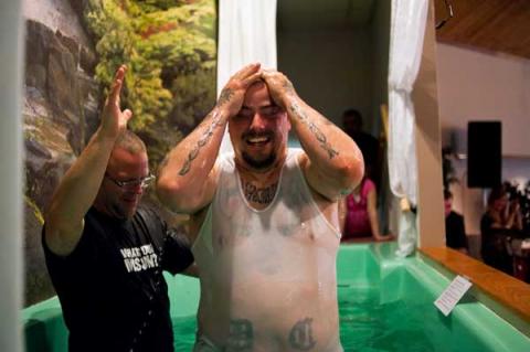 Chris Simpson after being baptized. RNS photo by Sean Proctor | MLive.com RNS photo by Sean Proctor | MLive.com