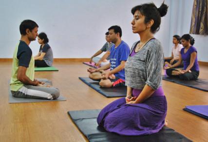 Private yoga instructor Shailendra Singh (far right) leads a group at The Yoga Guru club in Delhi. Photo by Vishal Arora via RNS
