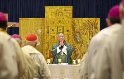 Archbishop Timothy Dolan of New York, president of the U.S. Conference of Catholic Bishops, celebrates Mass. Photo courtesy RNS.