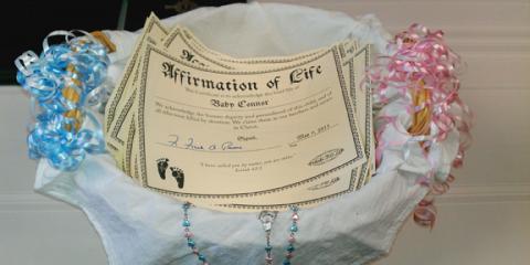 Priests for Life dedicated naming certificates for babies who died in clinic of Dr Gosnell. Photo via RNS/Priests for Life.