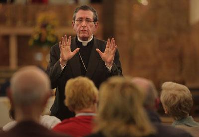 Bishop Richard Lennon implored protesters to vacate a closed Akron church in 2010. RNS photo by Gus Chan/The Plain Dealer RNS photo by Gus Chan/The Plain Dealer
