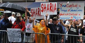 Anti-Shariah demonstrators rally against a proposed mosque near Ground Zero in New York. Via RNS