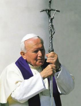 Pope John Paul II participates in a procession in August, 2000. Photo courtesy Universal Press Syndicate via RNS.