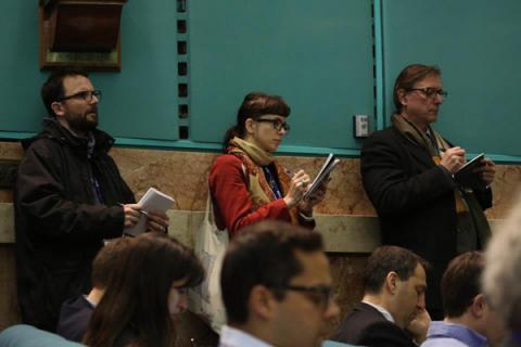 Reporters listen as cardinals speak to the press in the Vatican Tuesday. Photo courtesy Religion News Service.