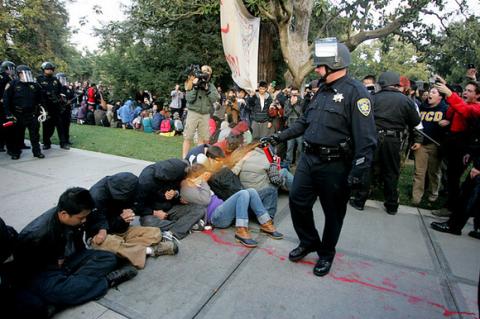 UC Davis student photojournalist Brian Nguyen's iconic photograph via The California Aggie http://bit.ly/t6DP3R UC Davis student photojournalist Brian Nguyen's iconic photograph via The Califo
