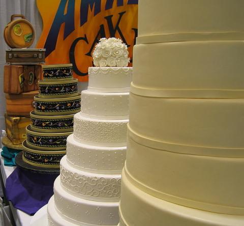 Wedding cakes at a bridal "expo" in Seattle. Image via Wiki Commons. Wedding cakes at a bridal "expo" in Seattle.