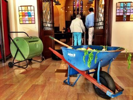 A wheelbarrow filled with vegetable scraps at Church of the Pilgrims. Photo by Andrew Satter, courtesy Ashley Goff / RNS