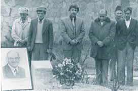 Afghans who worked with Ambassador Dubs gather around a makeshift memorial at the U.S. embassy in Kabul. / Family Photo