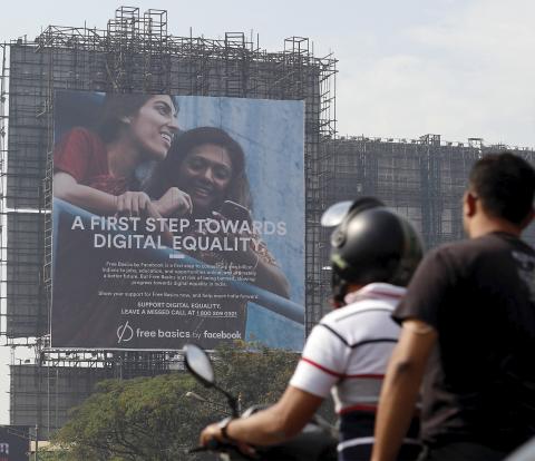 A billboard in Mumbai, India, promotes Facebook's Free Basics initiative. A billboard in Mumbai, India, promotes Facebook's Free Basics initiative.