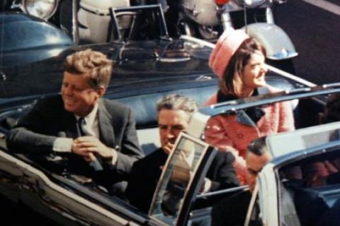 Lone gunman? President and Jacqueline Kennedy minutes before the assassination.
