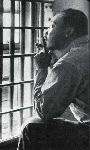 Photograph of Rev. Dr. Martin Luther King, Jr., in the Birmingham City Jail, April 1963.