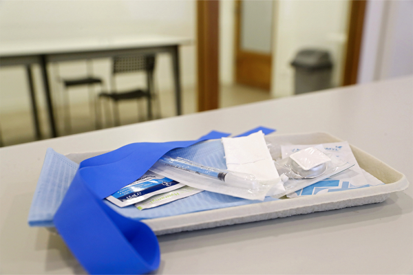 A tray with material for injections is seen at a supervised injection site.