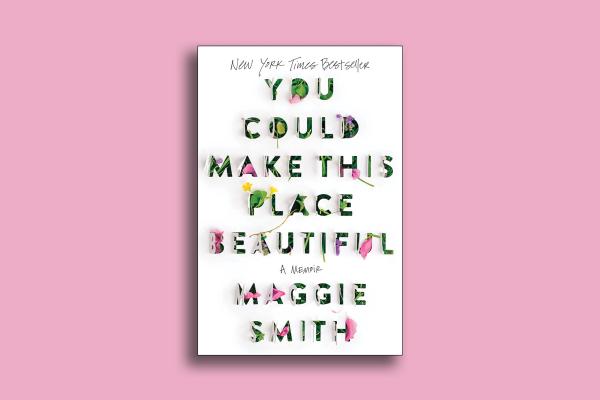 A picture of the book cover for "You Could Make This Place Beautiful" by Maggie Smith over a pink backdrop. The book cover features the title neatly cut into paper with the flaps opening to expose flowers and leaves poking through the letters.