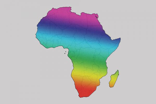 An illustration of Africa filled in with a rainbow gradient cast against a gray backdrop.