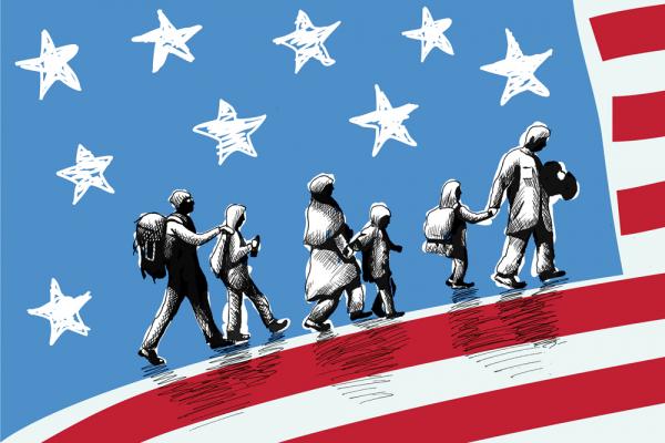 An illustration of pairs of migrants, depicted in shades of black and white and grey, wearing backpacks and walking in a line, superimposed over an in-color American flag.