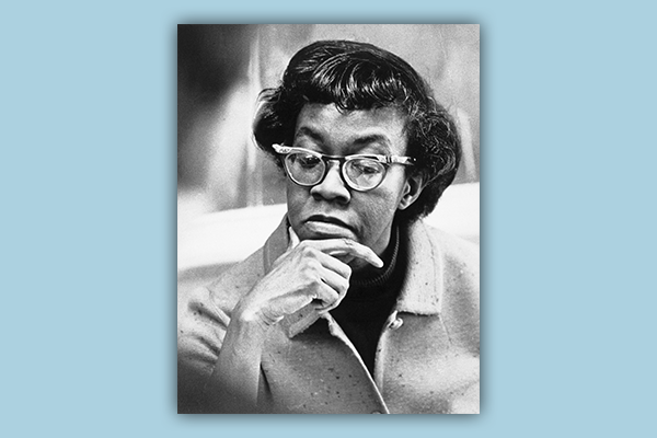 Gwendolyn Brooks holding chin in one hand and looking down, Chicago (1972)