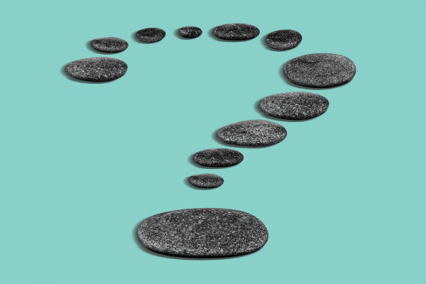 Illustration of round, flat stones in the shape of a question mark