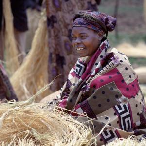Ugandan woman photo, Nigel Pavitt / Getty Images