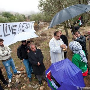 Palestinian Christians hold mass near Bethlehem to protest construction of Israe