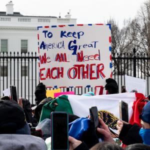 Crowds gather for a “Day Without Immigrants” demonstration in front of the White House, Feb. 14, 2022