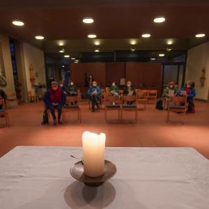 Candle in a Berlin church during prayer