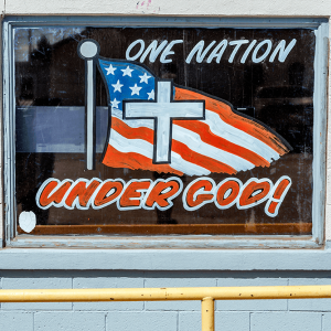 “One Nation Under God” American flag painting in Texas.