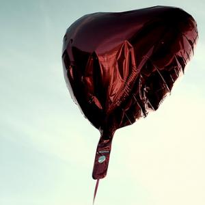 Red heart balloon. Image via Wylio, http://bit.ly/yctzSw.