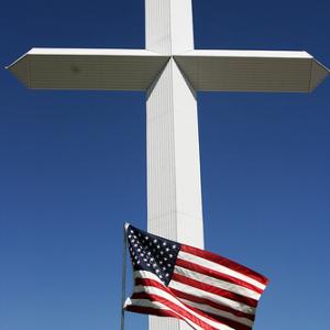 Cross and Flag. Image via Wylio http://bit.ly/rU6OGA