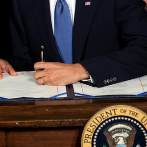 President Barack Obama signs the health insurance reform bill, March 23, 2010. P
