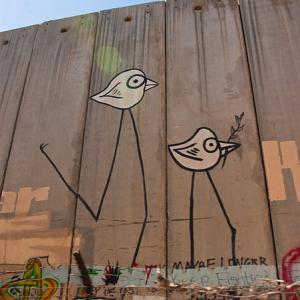 Graffiti on the "security wall" that runs through Bethlehem. Via http://commons.