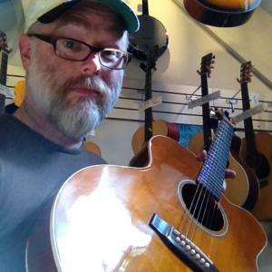 The author and the object of his affection: the seven-string guitar.