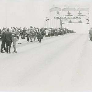 Marchers stopped at Edmund Pettus bridge. Image via Penn State Special Collectio