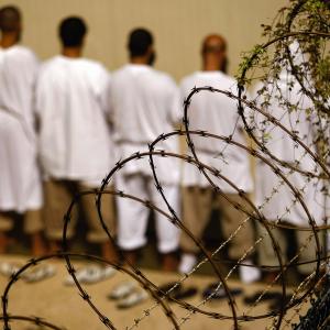 Guantamo Bay prison image by John Moore/Getty Images.