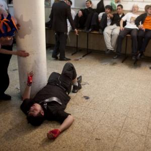 Drunk man during Purim festivities in Israel, 2011. Photo by Uriel Sinai/Getty I